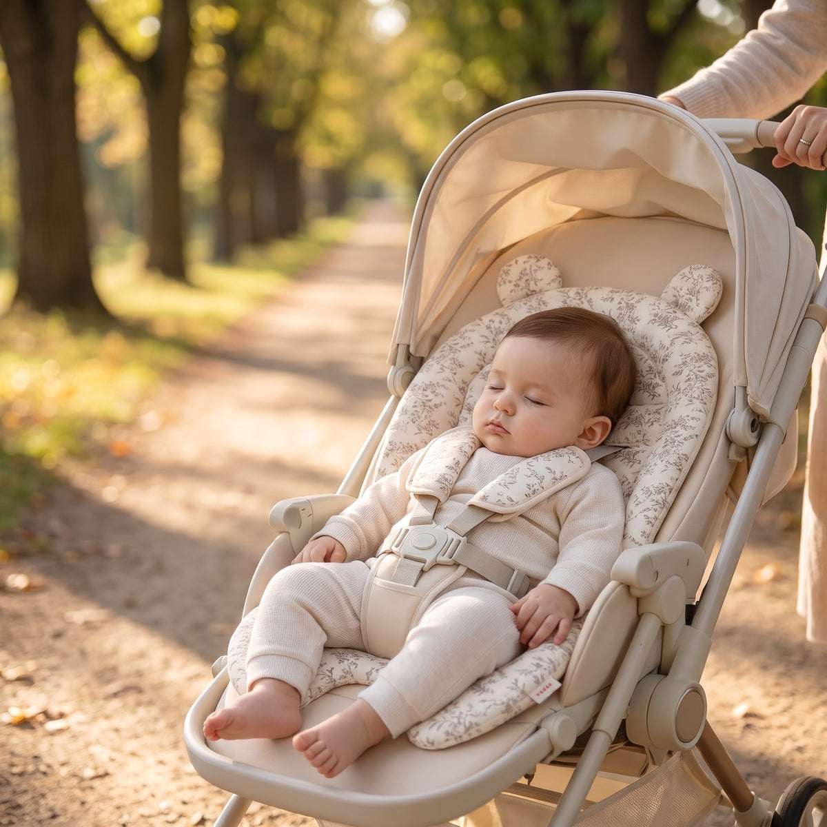 momi-11-1 baby asleep supported by stroller insert