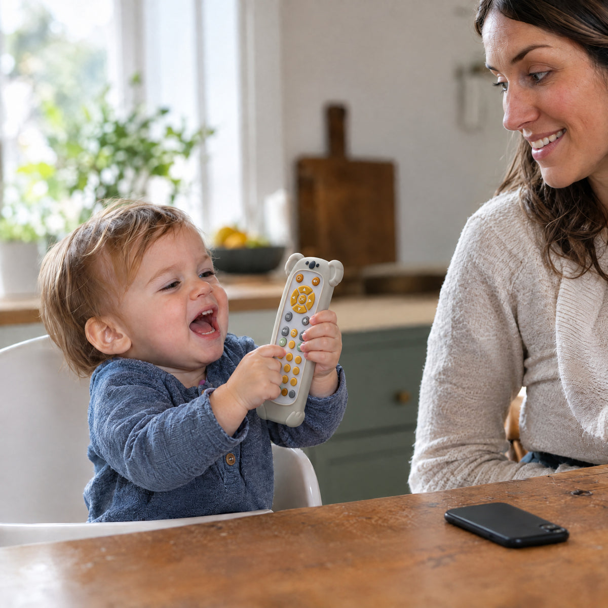 Baby Phone Toy, after: With Momi Toys phone toy