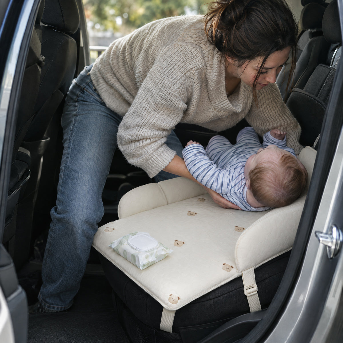 Portable Changing Pad, after: With Momi Toys changing pad