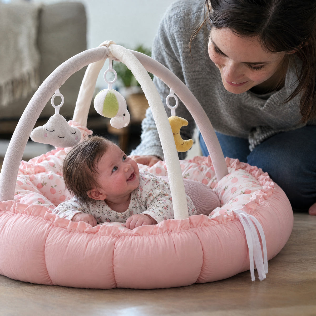 Baby Play Gym & Tummy Time Nest, after: With Momi Toys play nest
