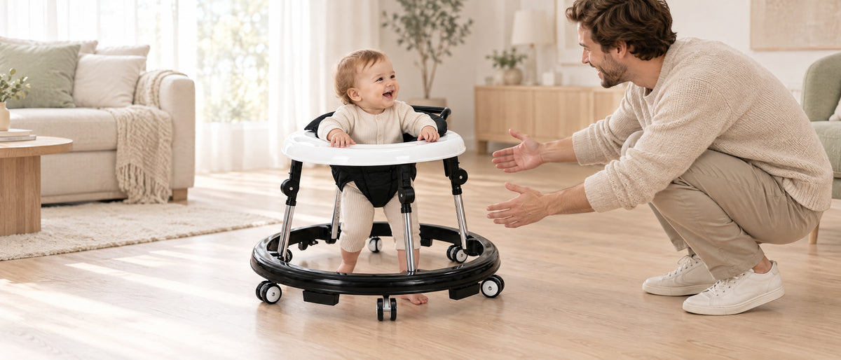 Smiling baby in the Momi Toys walker with dad cheering him on