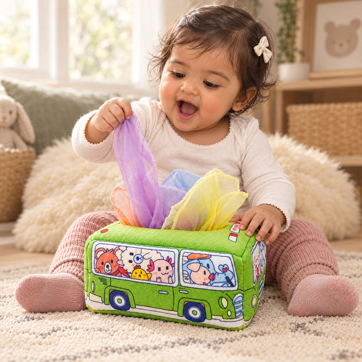 Child playing with the Momi Toys tissue box sensory toy lifestyle photo