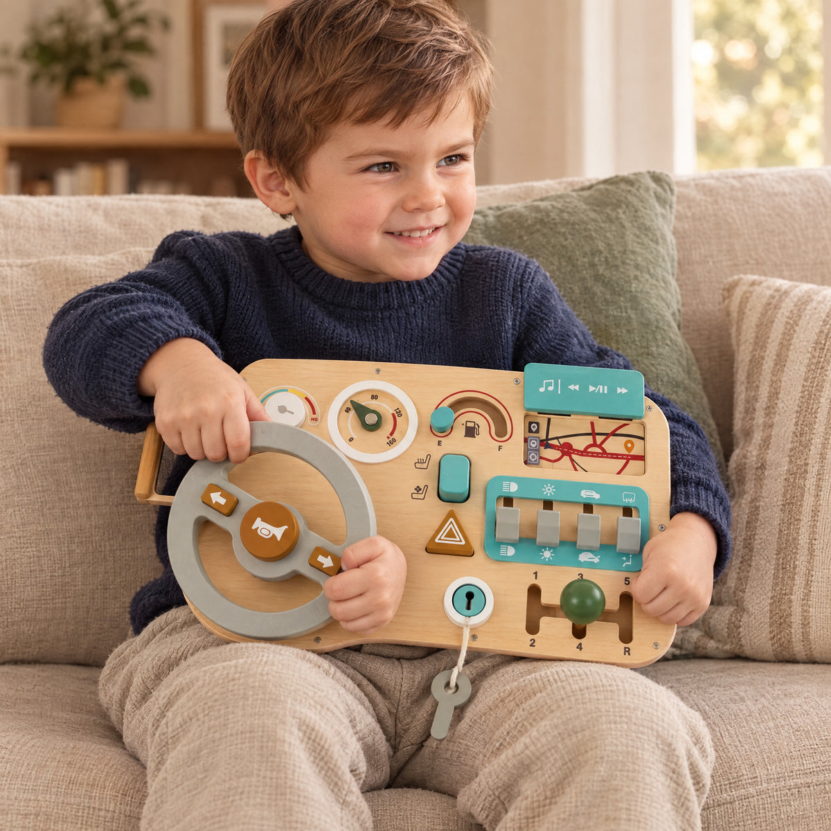 Child playing with the Momi Toys wooden steering wheel toy lifestyle photo