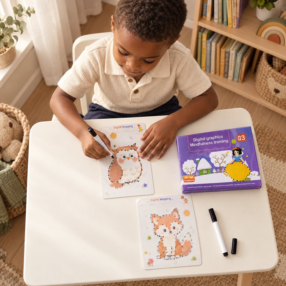Child using the Momi Toys reusable writing workbook digital graphics lifestyle photo
